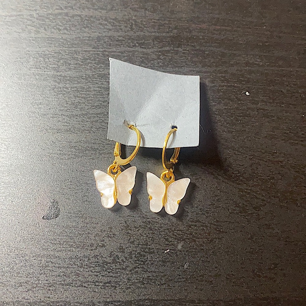 White butterfly gold earrings